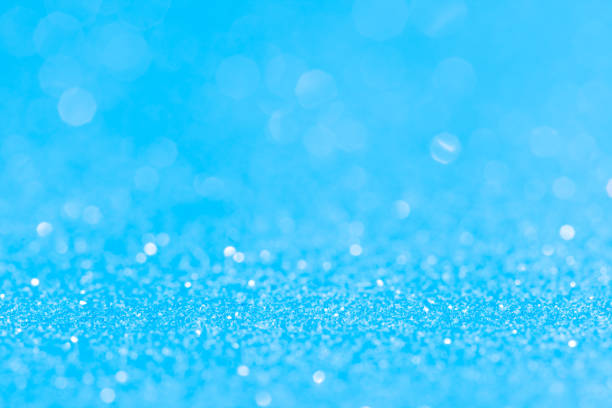 istock sparkles of Blue glitter abstract background. Copy space 1360228848