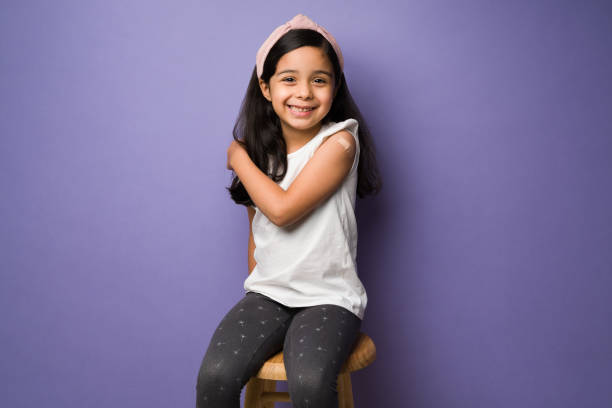 istock Cheerful girl after getting an injection 1360229001