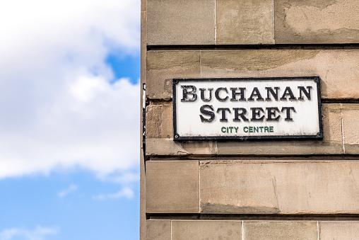 A sign for Buchanan Street in Glasgow, Scotland. The street is in the heart of the city centre, and is a well known shopping street.