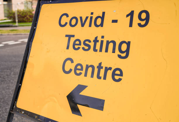 istock Covid-19 Test Centre sign close-up 1360229199