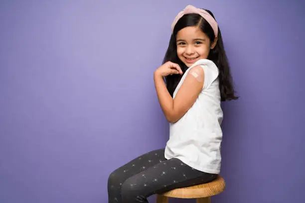 Photo of Profile of a child after getting a shot