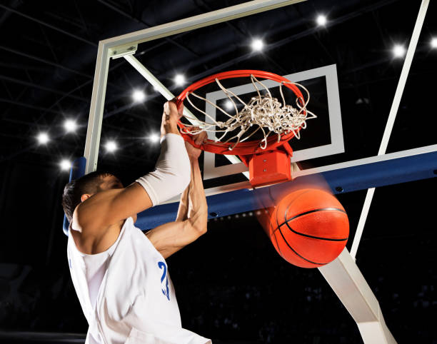 istock Man basketball player. Dunk. Number 23 1360232941