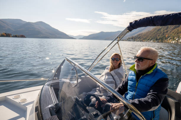 istock Daughter and father taking the boat out for a ride 1360234528