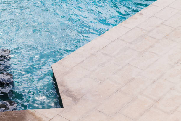 istock Corner of a swimming pool, top view. Minimal architecture 1360234829