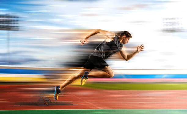 istock Man running on the athletic track 1360235549