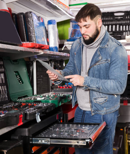istock Male is standing with new ratchet 1360238929
