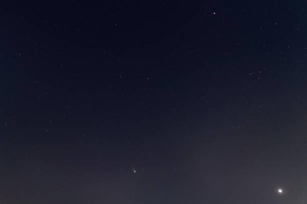 istock C/2021 A1 comet (LEONARD) in Chiang Mai City Thailand. 1360240207