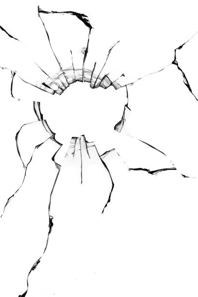 istock Cracked broken glass, hole in broken window texture on white background. 1360243381