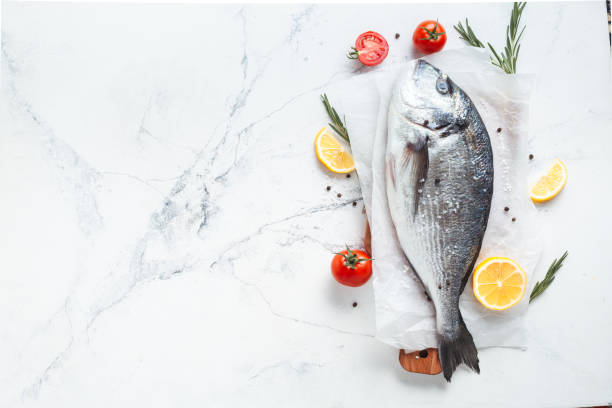 istock Flat lay of fish ready to cook 1360247361