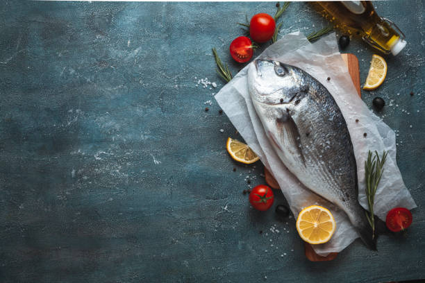 istock Flat lay of fish ready to cook 1360247416