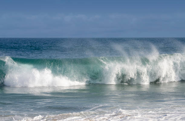 istock Breaking Wave and Spindrift, Newport Beach, California 1360247530