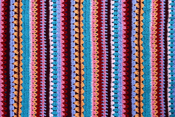 Crochet texture of colored striped knitted fabric
