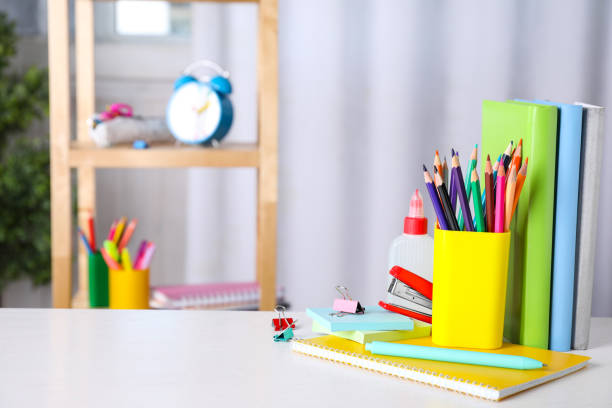 istock Different school stationery on white table indoors. Space for text 1360252353