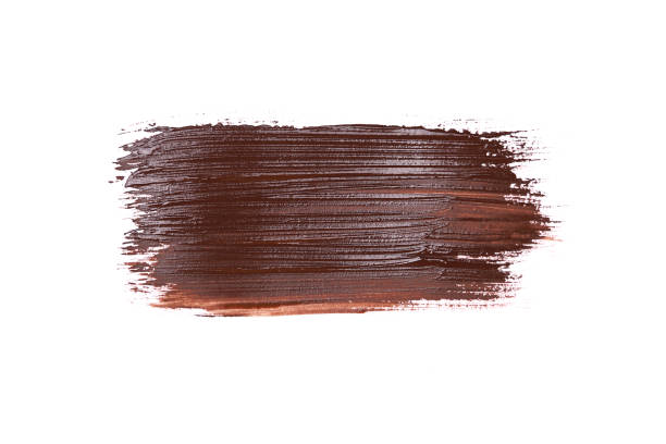 istock brushstroke of brown paint isolated on white 1360252739
