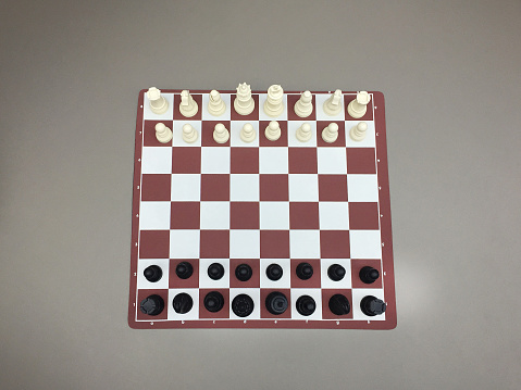 High angle view chess board on the gray background