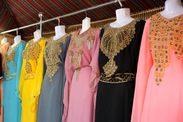 istock Traditional Arabic dresses in different colors at a bazaar in Dubai 1360260853