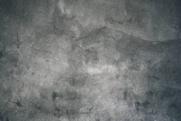 istock Dark green gray concrete cracked wall texture background 1360268648
