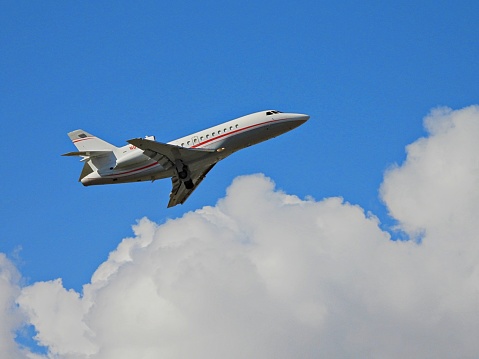 Boca Raton, Palm Beach County, Florida, USA. December 20, 2021: A Dassault-Breguet fixed wing multi engine
(12 seats / 3 engines) taking off from the Boca Raton Airport. N670JD. MFR Year: 1988.