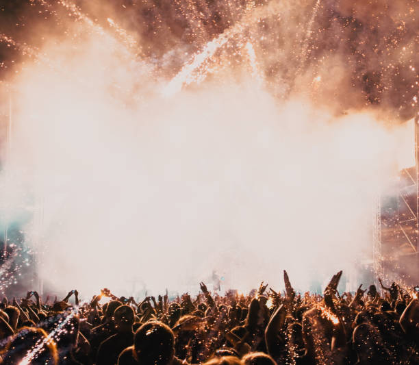 istock crowd and explosive fireworks New Year celebrations 1360270053