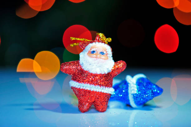 istock Christmas gifts and abstract background light 1360270301