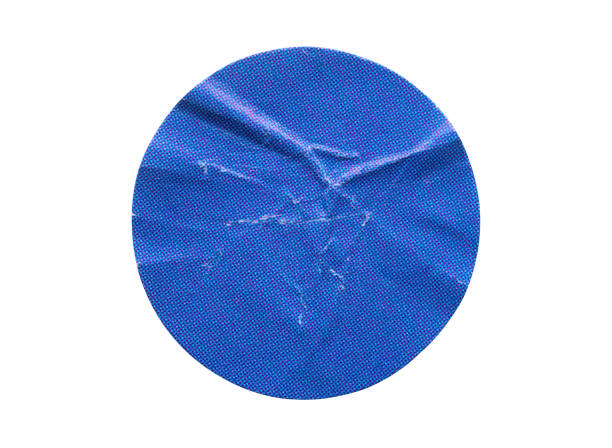 istock Blank blue round adhesive paper sticker label isolated on white background 1360274272
