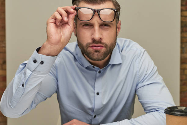 istock Steadfast glance of the serious office worker 1360277710