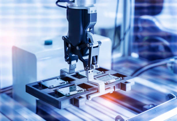 istock automatic robot for print circuit board (PCB)assembly machine during soldering or welding part 1360279237