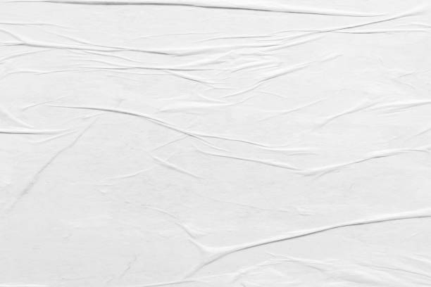 istock white crumpled and creased paper poster texture background 1360280188