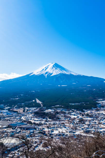istock Mountain Fuji and city in winter 1360290224