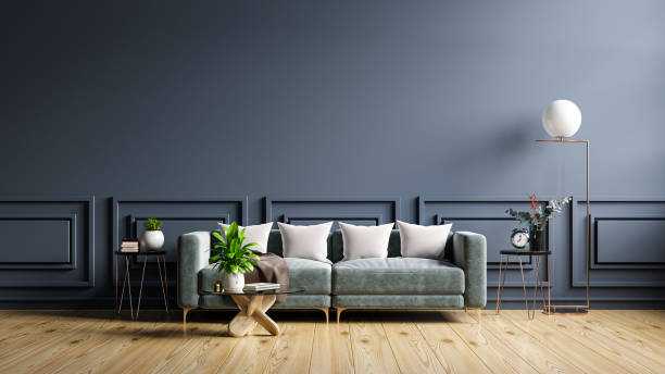 istock Mockup living room interior with sofa on empty dark blue wall background. 1360290874