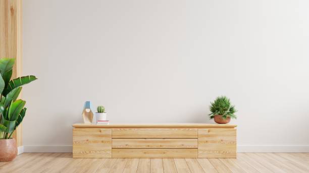 istock Cabinet for tv interior in white wall mockup. 1360290913