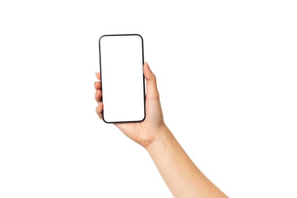 istock Hand young woman holding mobile smartphone with blank screen isolated on white background with clipping path 1360291948