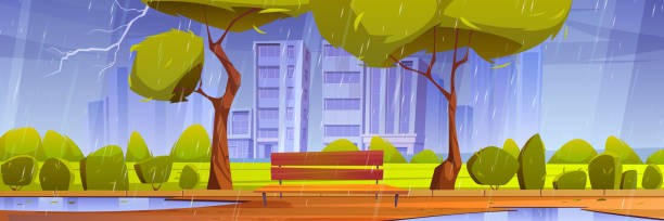 istock City park with bench at rainy weather, summer rain 1360299091