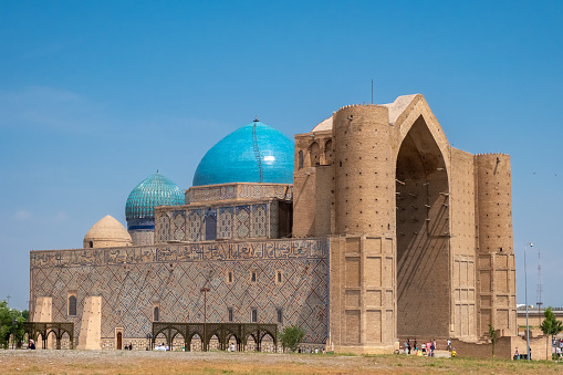 The Mausoleum of Khoja Ahmed Yasawi in the city of Turkestan. UNESCO World Heritage Site. Religion site. Travel, tourism concept. Silk road. 07.05.2021 Turkestan, Kazakhstan.