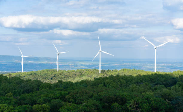 istock Windmills on mountain for generating electricity.  Eco power concept 1360301835