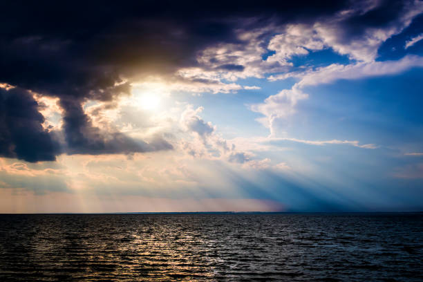 Sunset Landscape at Seaside Beautiful Summer Landscape of the Sea and Sunset sun above clouds stock pictures, royalty-free photos & images