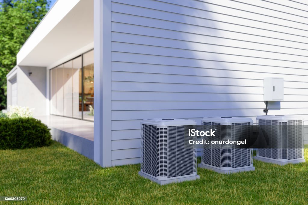 Exterior Of Villa With Air Heat Pumps In The Backyard Air Conditioner Stock Photo