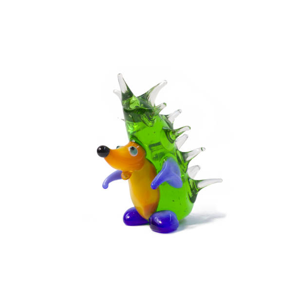 istock Miniature glass hedgehog figure isolated on white background 1360306978