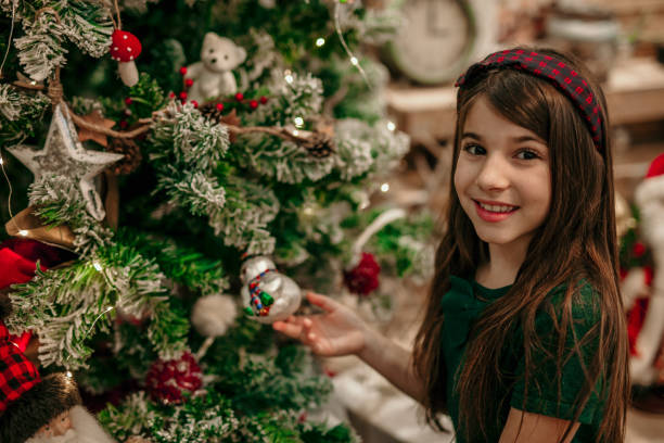 istock Putting my favorite Christmas tree decoration 1360306994