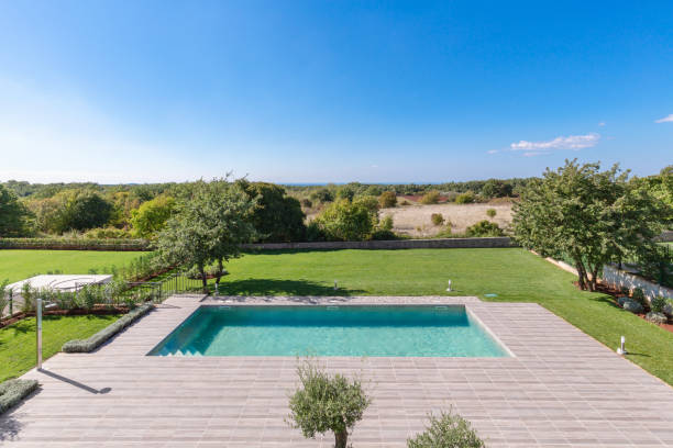 istock Privete swimming pool and yard garden 1360310099