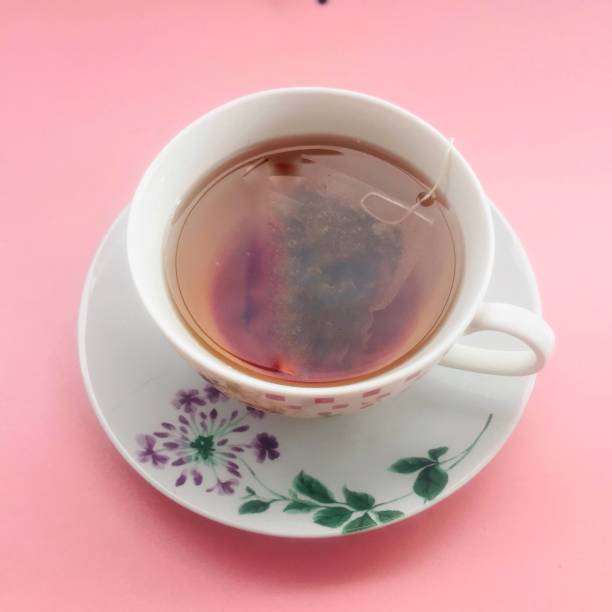 istock A cup of warm tea is served in a cup on the table. 1360310661