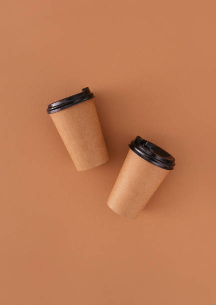 istock coffee paper cups with place for logo 1360313431