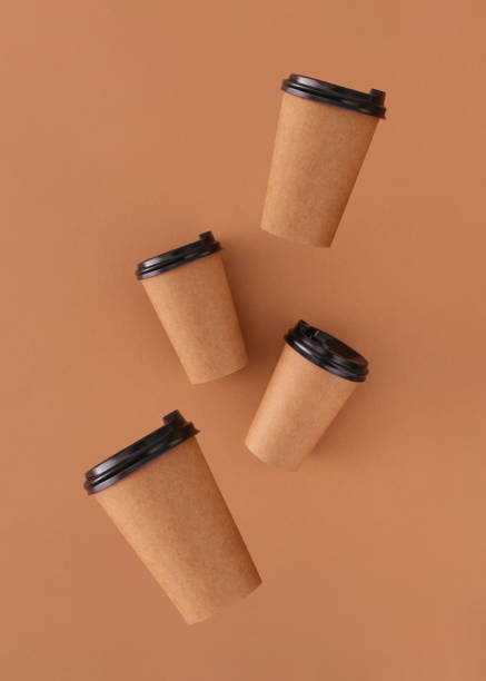 istock coffee paper cups with place for logo 1360313438