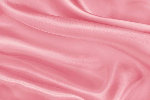 istock Rose gold fabric texture background, detail of silk or linen pattern. 1360313677