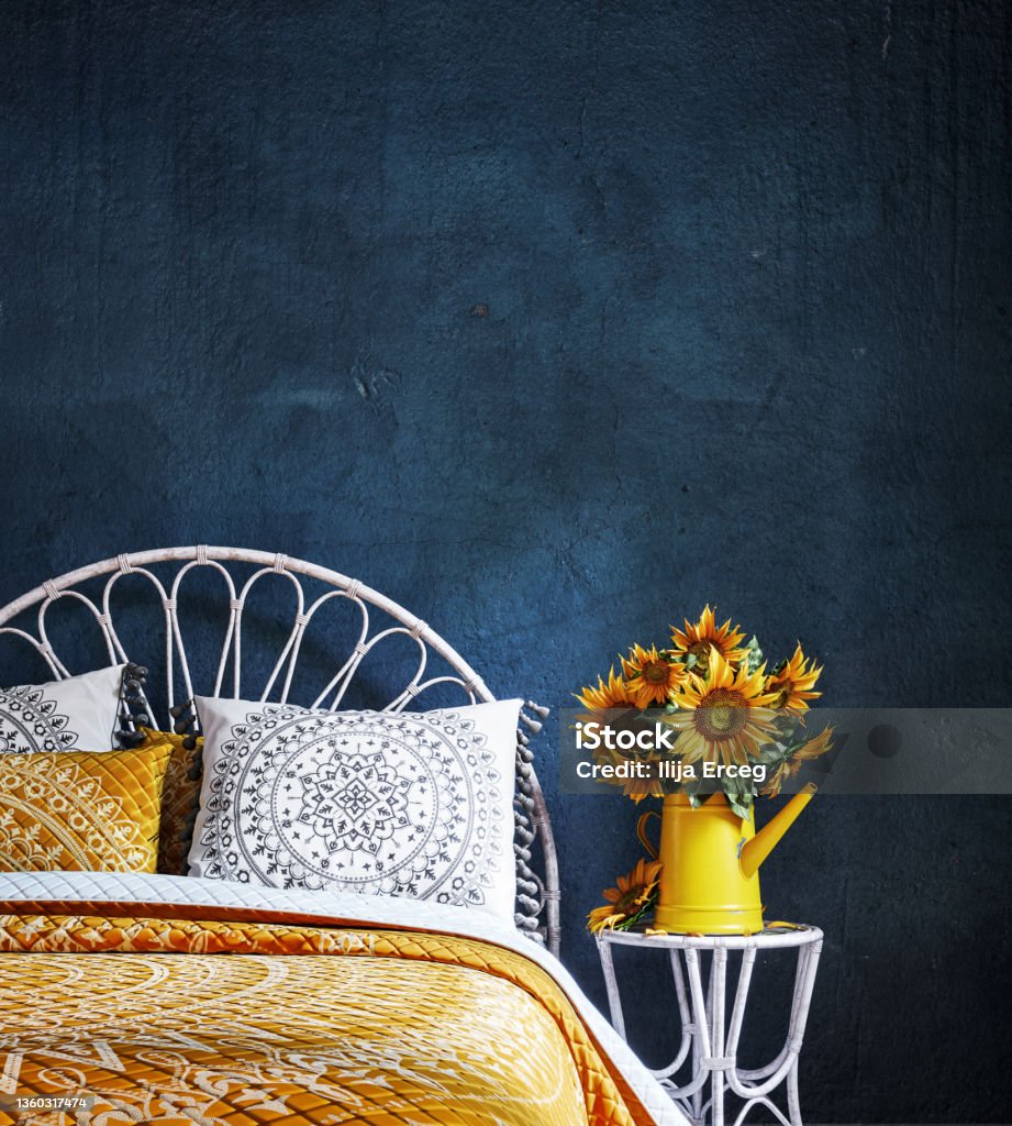 Bedroom interior with sunflowers decoration and grungy blue wall background Bedroom interior with sunflowers decoration and grungy blue wall background 3D Rendering, 3D Illustration Bedroom Stock Photo