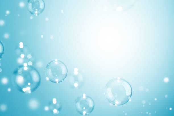 istock Beautiful Transparent  Shiny Blue Soap Bubbles Background. Celebration, White Bokeh Bubbles Backdrop. Christmas Wallpaper. White Copy Space. 1360318961