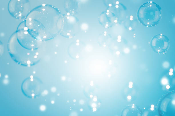 istock Beautiful Transparent  Shiny Blue Soap Bubbles Background. Celebration, White Bokeh Bubbles Backdrop. Christmas Wallpaper. 1360318966