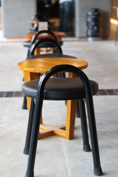 istock industrial wood bench on a cafe 1360319807