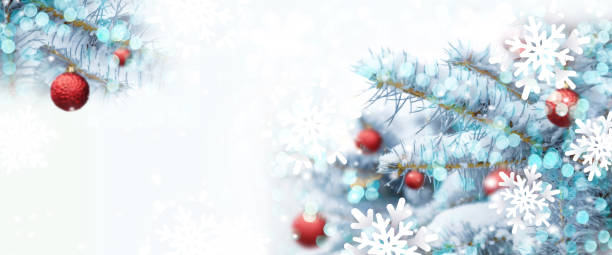 istock Christmas tree background with shiny blurred light, red xmas balls decoration in fir tree with copy space 1360321999