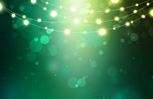 istock Festive illustrated card with a shining garland and blurry lights. 1360322531